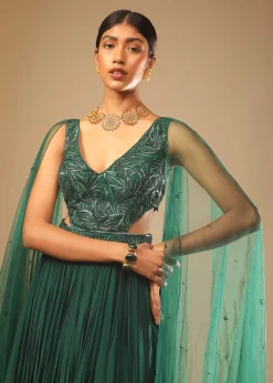 Bottle Green Gown In Crepe With Side Cut Outs In The Hand Embroidered Bodice