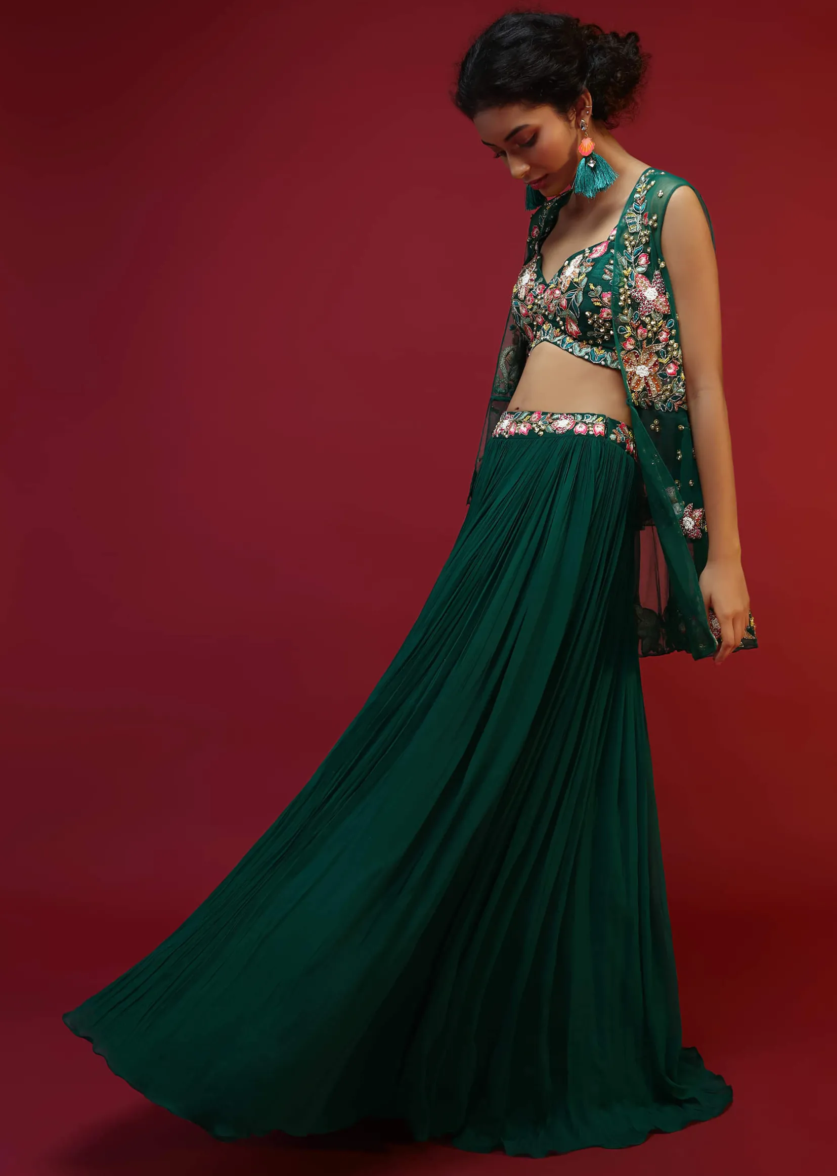 Bottle Green Lehenga Choli And Sleeveless Peplum Jacket Adorned With Colorful Resham And Moti Embroidered Flowers