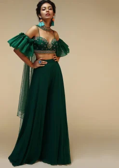 Bottle Green Palazzo Suit With A Cold Shoulder Crop Top Featuring Short Bell Sleeves And Multi Colored Hand Embroidery