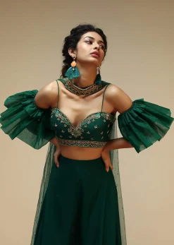 Bottle Green Palazzo Suit With A Cold Shoulder Crop Top Featuring Short Bell Sleeves And Multi Colored Hand Embroidery