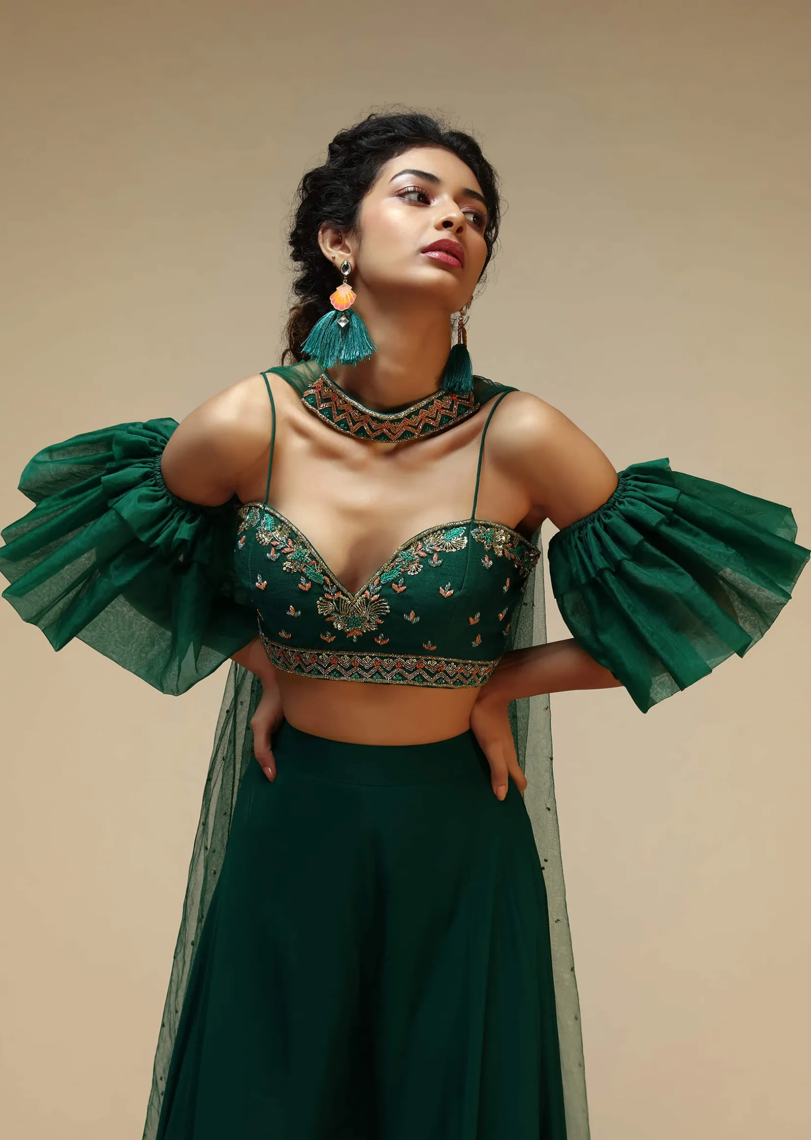 Bottle Green Palazzo Suit With A Cold Shoulder Crop Top Featuring Short Bell Sleeves And Multi Colored Hand Embroidery
