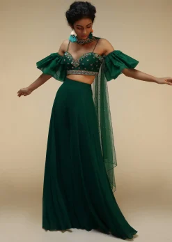 Bottle Green Palazzo Suit With A Cold Shoulder Crop Top Featuring Short Bell Sleeves And Multi Colored Hand Embroidery