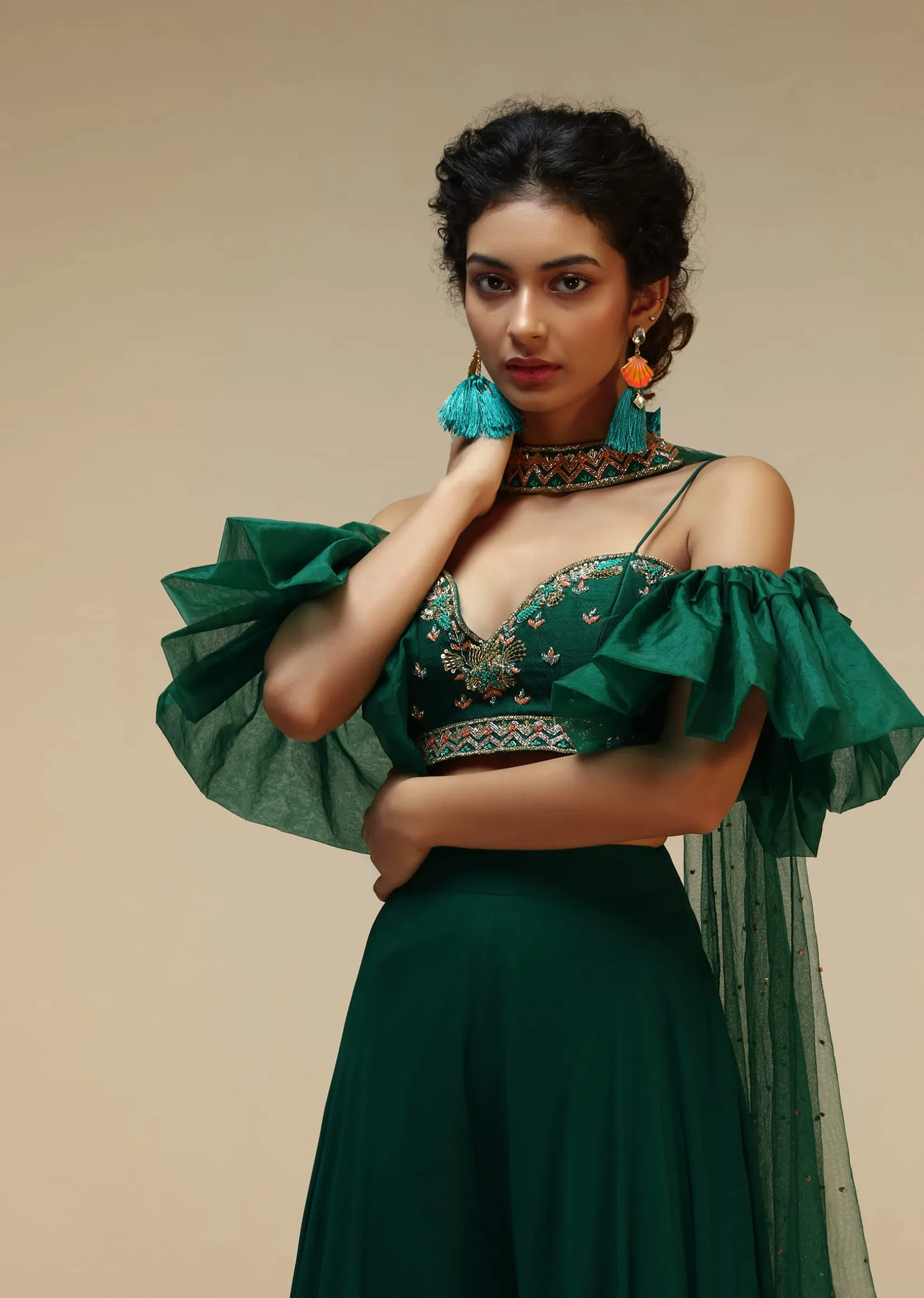 Bottle Green Palazzo Suit With A Cold Shoulder Crop Top Featuring Short Bell Sleeves And Multi Colored Hand Embroidery