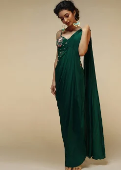 Bottle Green Saree Gown With A Crepe Cowl Drape And Sheer Embroidered Net Bodice With Colorful Resham Flowers