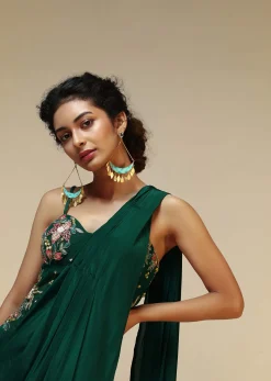 Bottle Green Saree Gown With A Crepe Cowl Drape And Sheer Embroidered Net Bodice With Colorful Resham Flowers