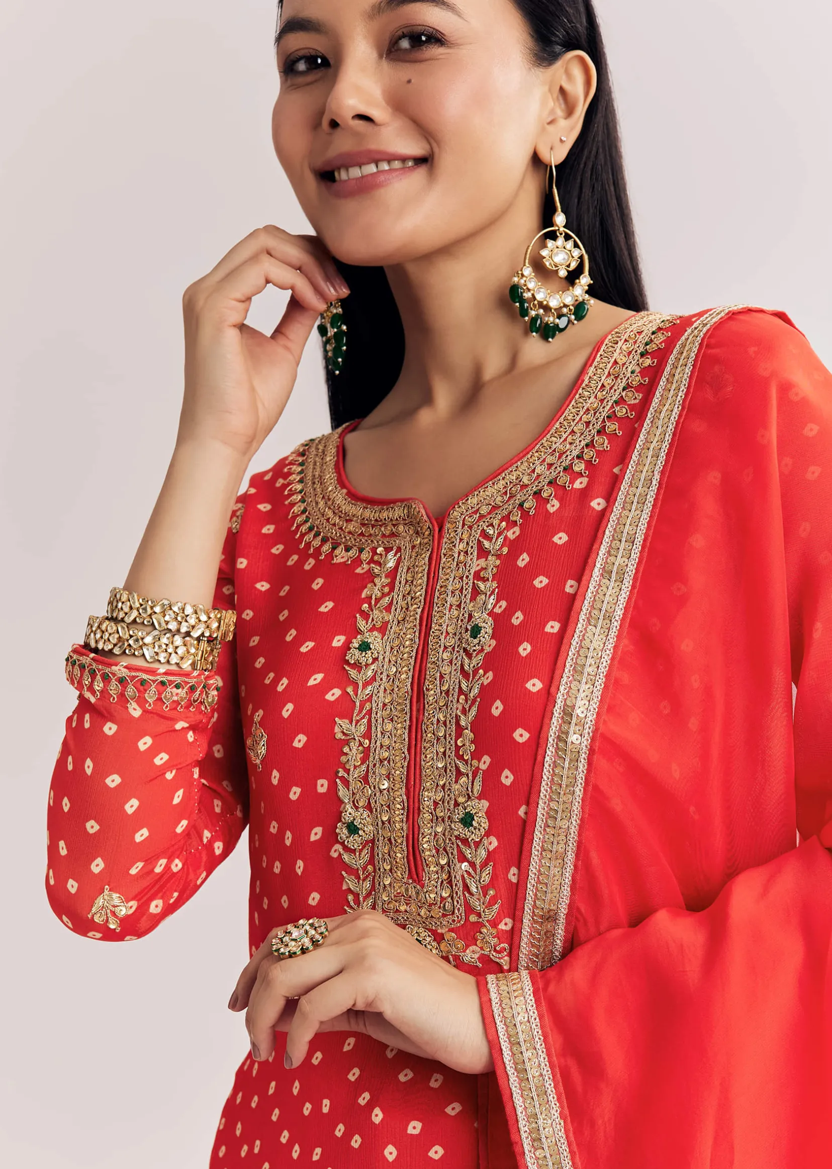 Bright Orange Bandhani Kurta Palazzo Suit With Sequins And Zardosi Work