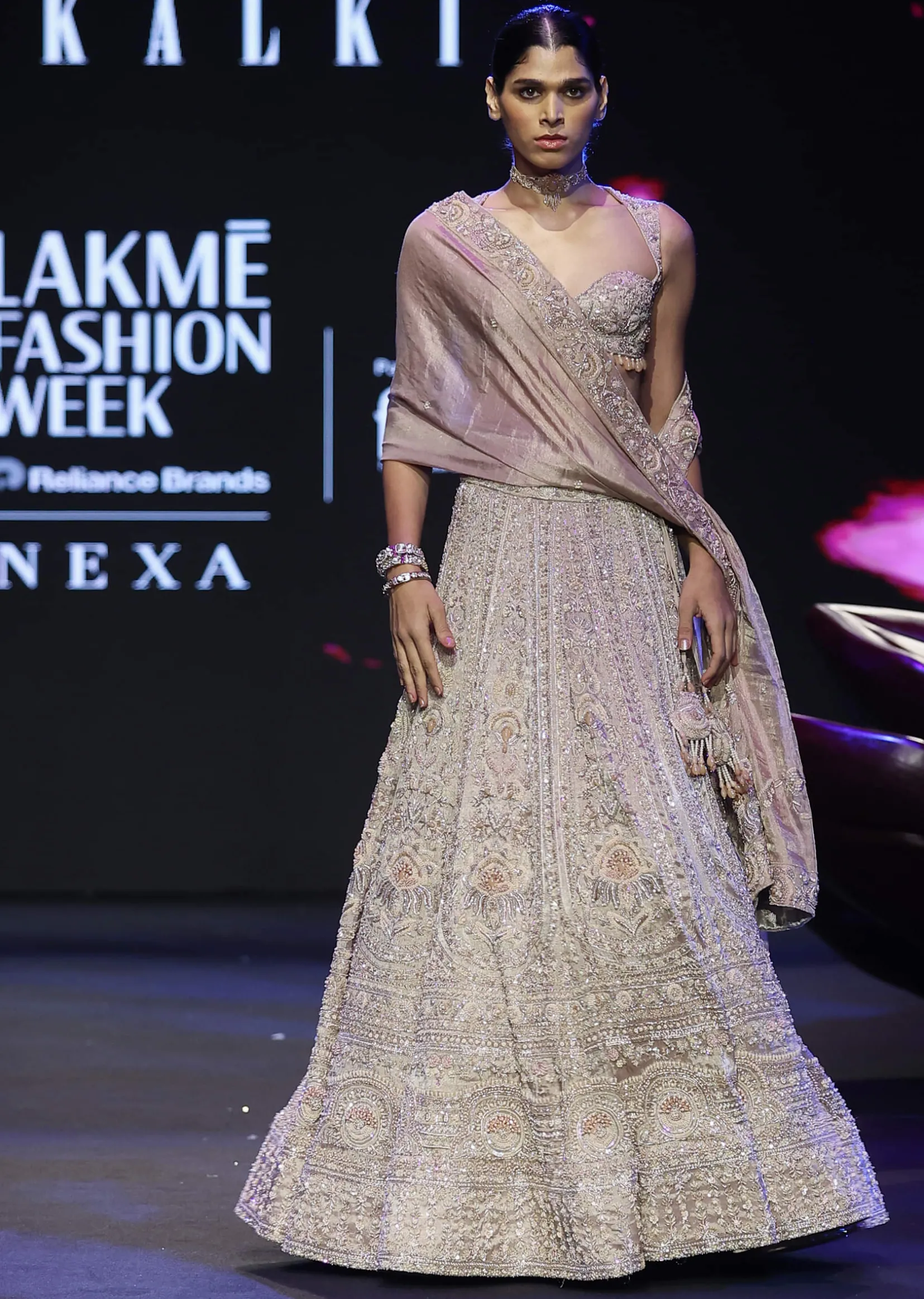 Bronze Self Embroidered Lehenga Set With Two Dupattas