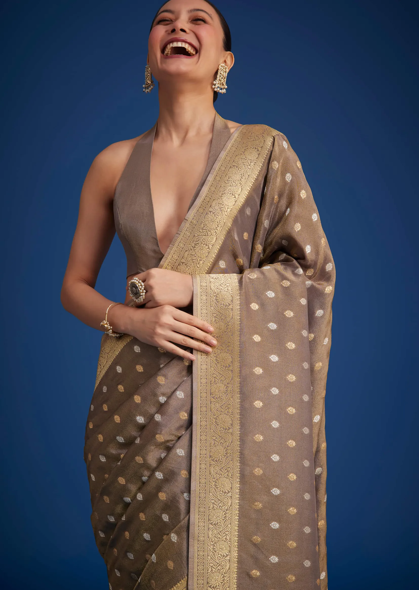 Brownish Grey Tissue Silk Saree With Zari Border And Butti Work