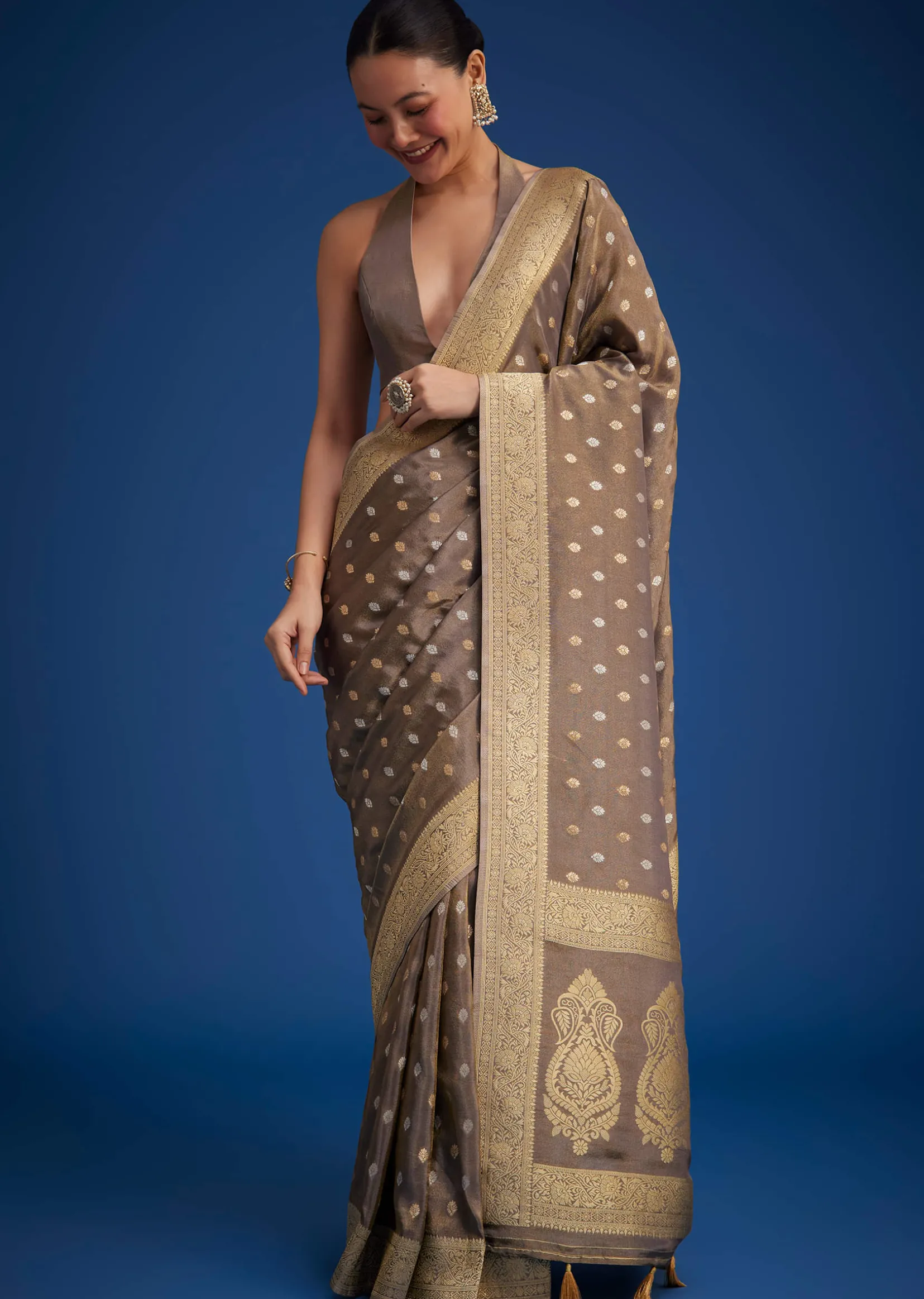 Brownish Grey Tissue Silk Saree With Zari Border And Butti Work