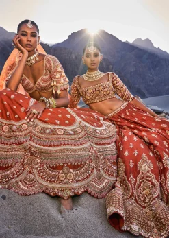 Burnt Orange Embroidered Silk Lehenga With Two Dupattas