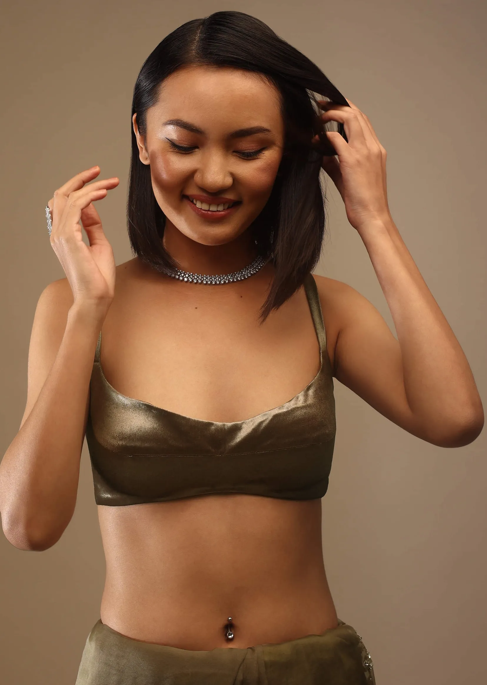 Butternut Olive Satin Spaghetti Strap Blouse With A Curved Neckline Tie Down At The Back