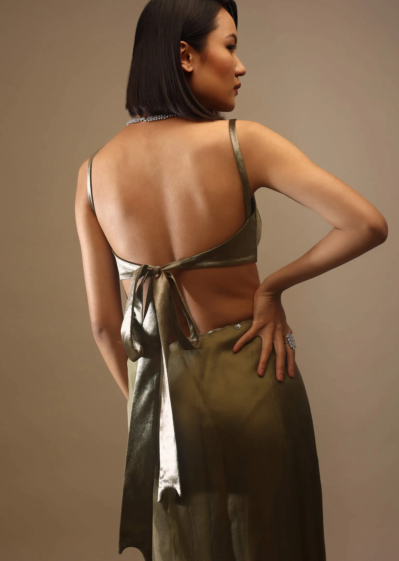 Butternut Olive Satin Spaghetti Strap Blouse With A Curved Neckline Tie Down At The Back