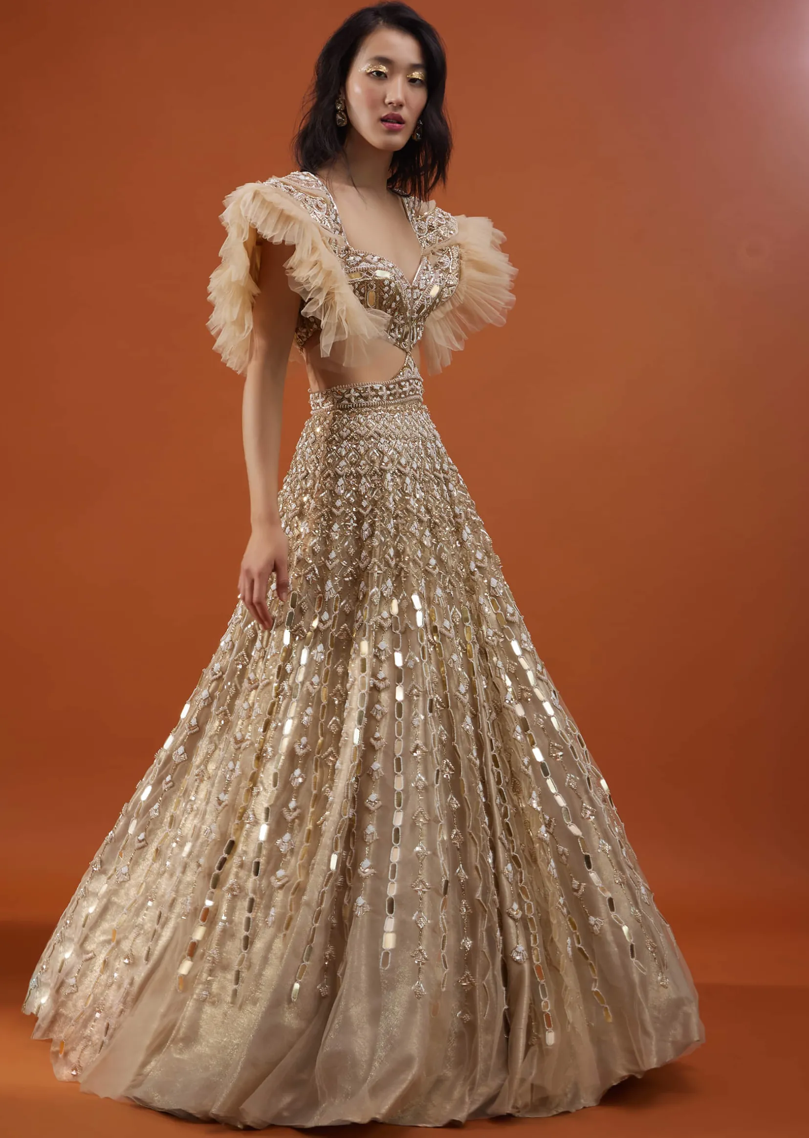 Champagne Gold Angelic Net Gown With Mirror Work And Ruffle Sleeves - NOOR 2022