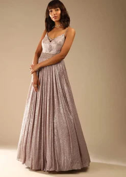 Champagne Gown Embellished In Sequins With Cut Dana Embellished Sheer Net On The Waist And Criss Cross Straps On The Neckline Online - Kalki Fashion