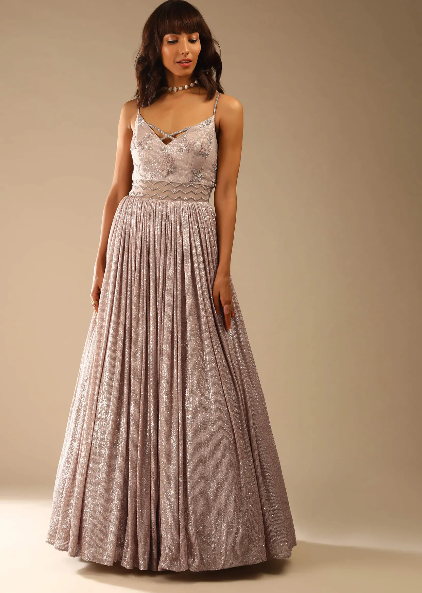 Champagne Gown Embellished In Sequins With Cut Dana Embellished Sheer Net On The Waist And Criss Cross Straps On The Neckline Online - Kalki Fashion