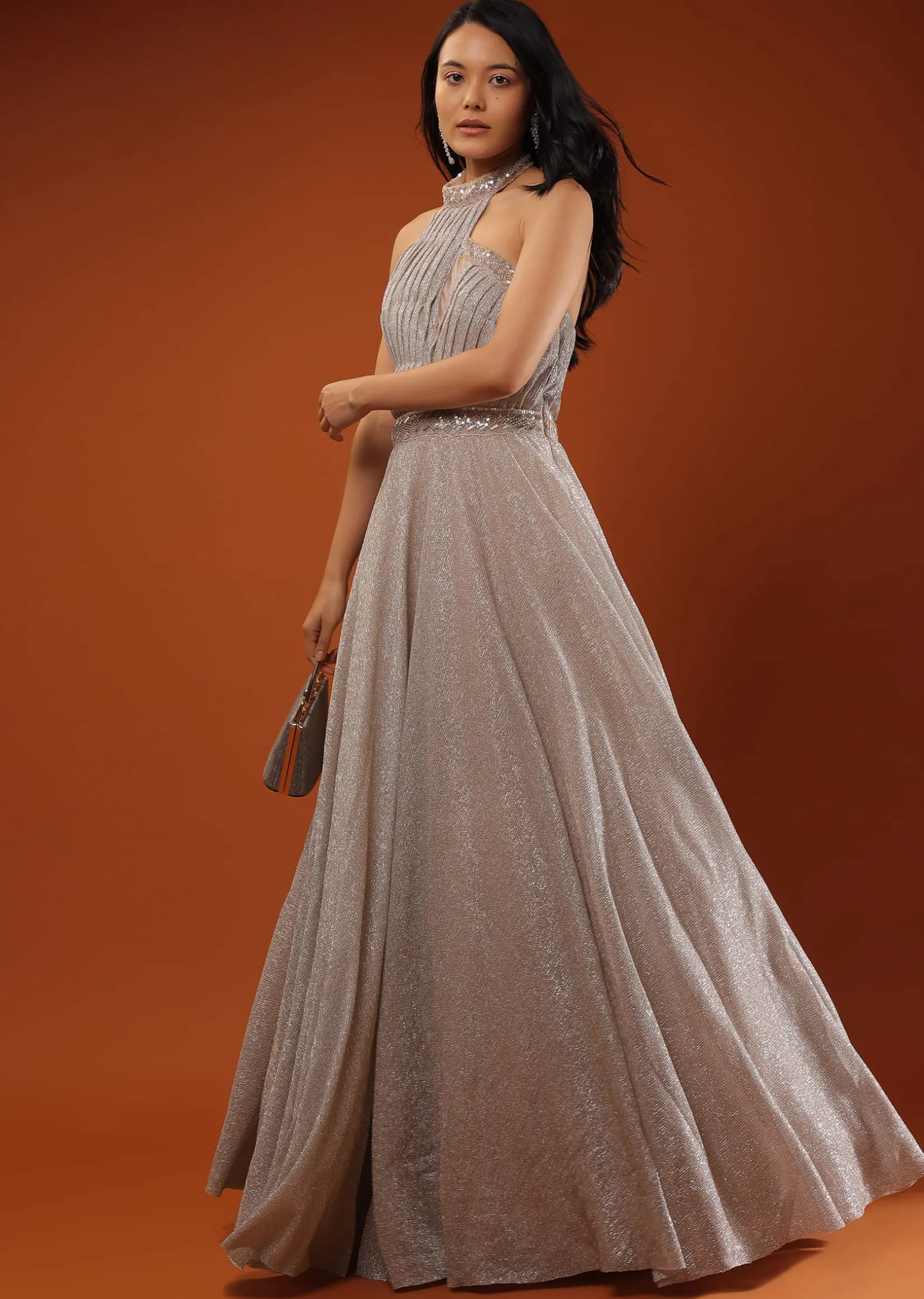 Champagne Gown In Shimmer Crush With Halter Neckline And Pleated Bodice Featuring Sheer Cut Out