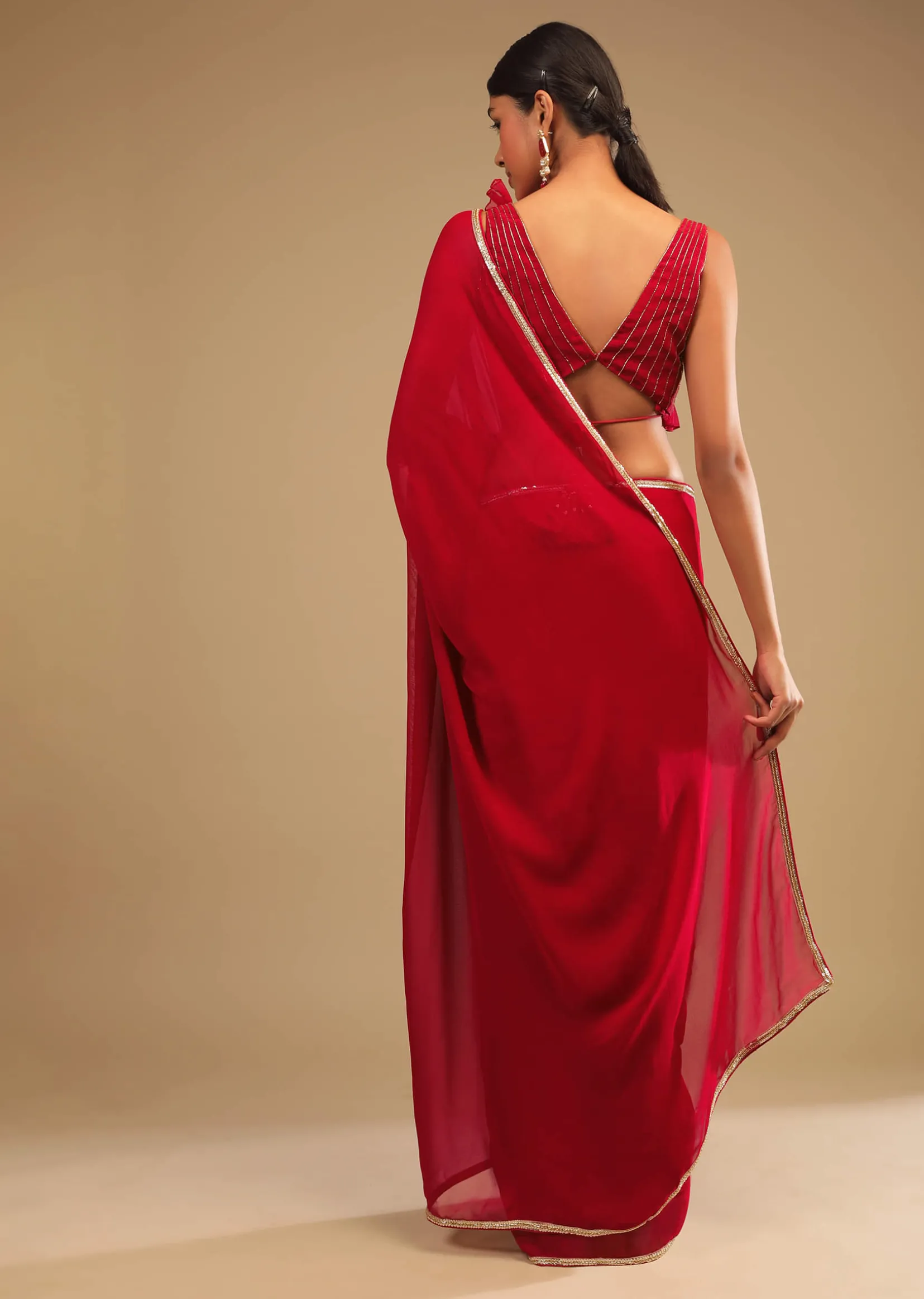Cherry Red Saree In Georgette With Sequins And Cut Dana Embellished Border And A Ruffle Frill Adorned Crop Top