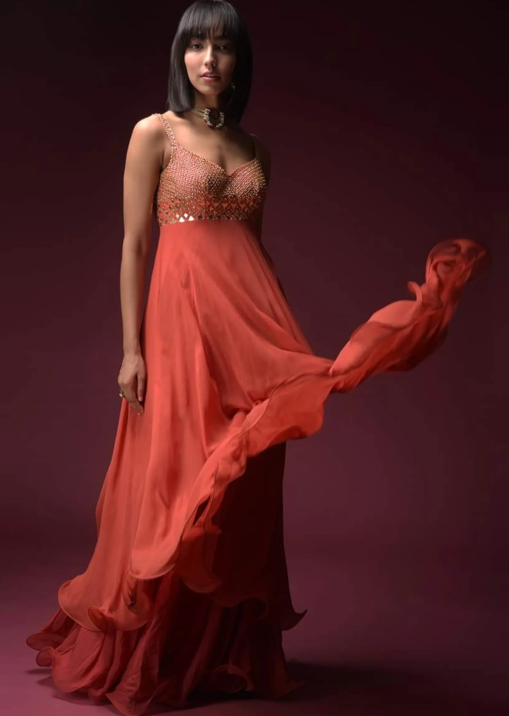 Coral Anarkali Suit With Geometric Shaped Mirror Accented Bodice And Fun Layered Hemline