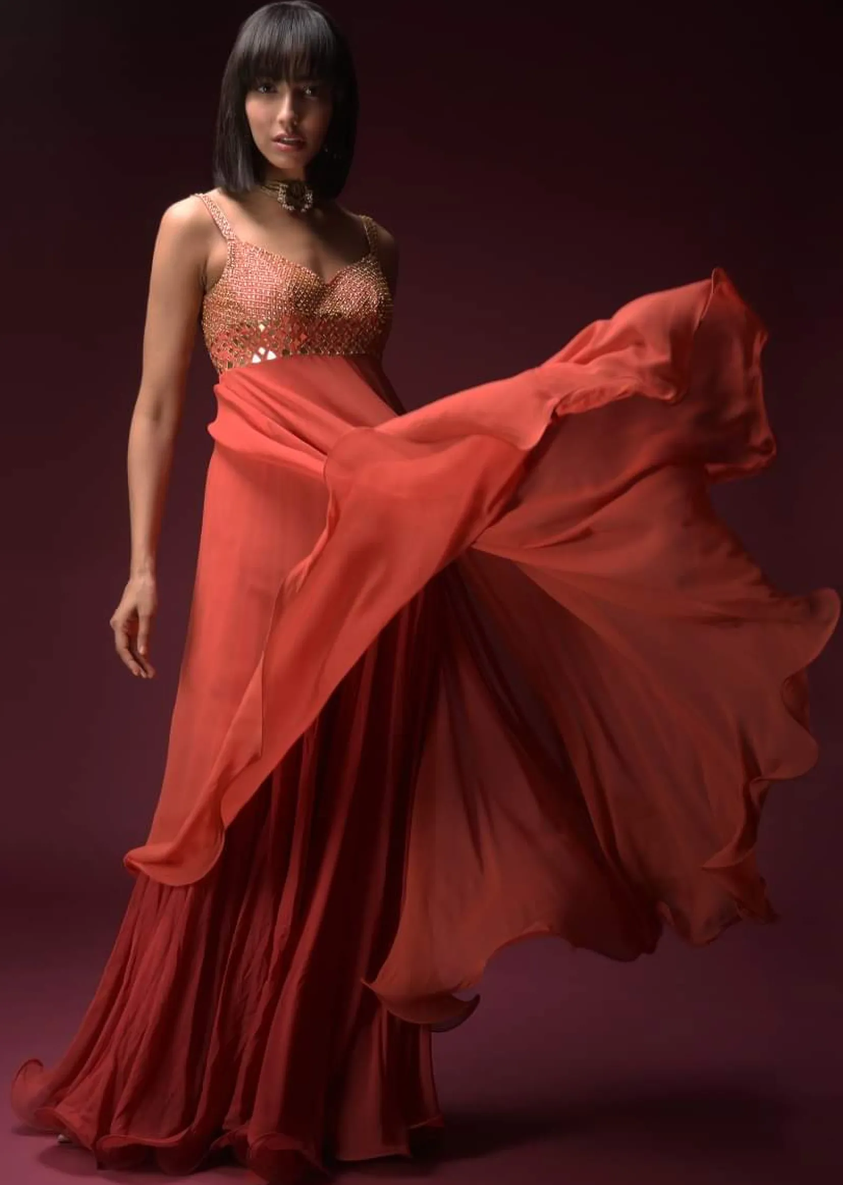 Coral Anarkali Suit With Geometric Shaped Mirror Accented Bodice And Fun Layered Hemline