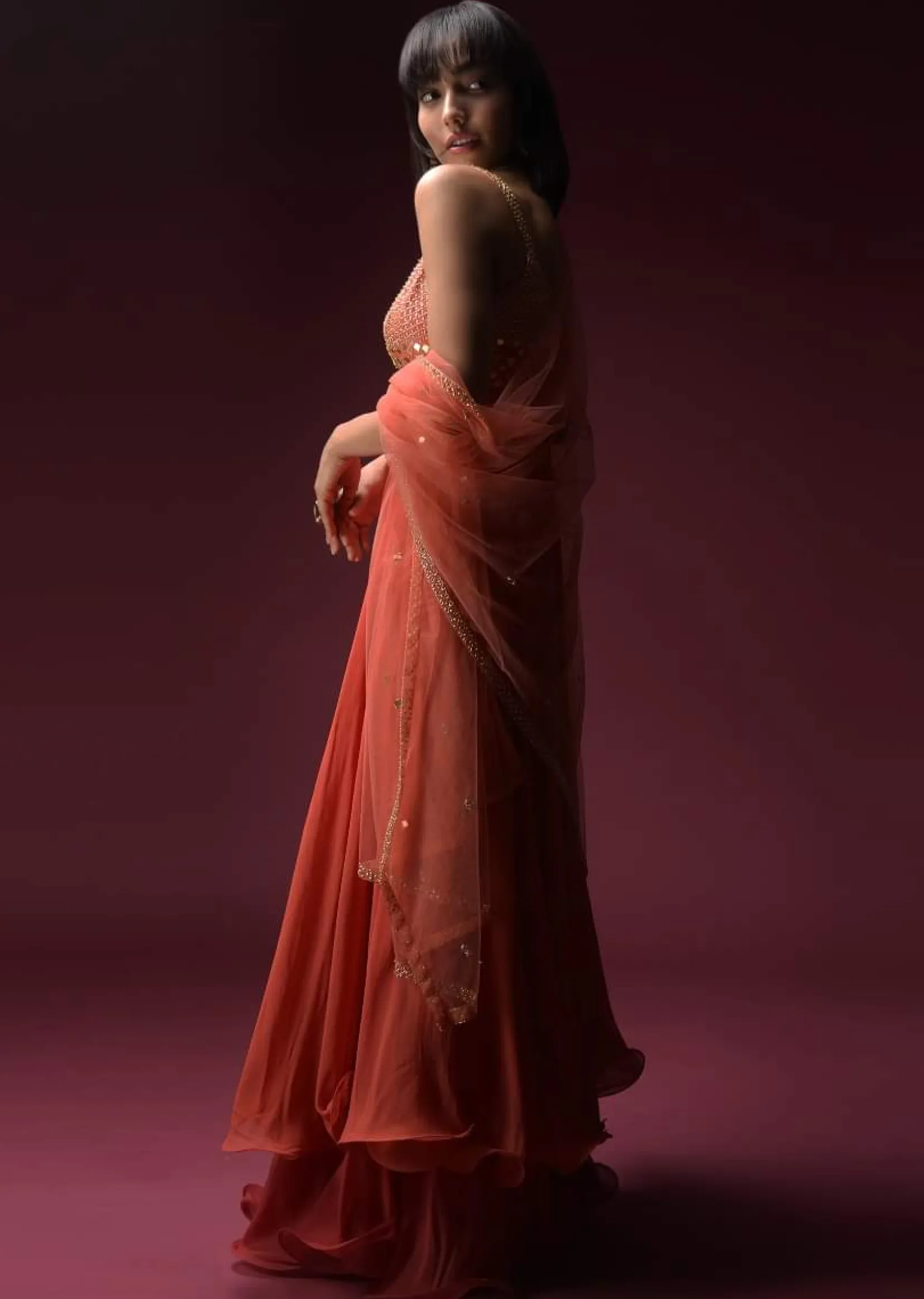 Coral Anarkali Suit With Geometric Shaped Mirror Accented Bodice And Fun Layered Hemline