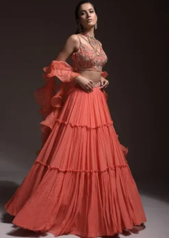 Coral Tiered Skirt And Crop Top With Cutdana Embellished Floral Blossoms And Ruffle Dupatta