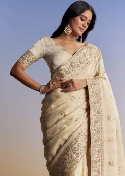 Cream Jacquard Silk Saree With Zari Brocade And Zardosi Embellished Pallu