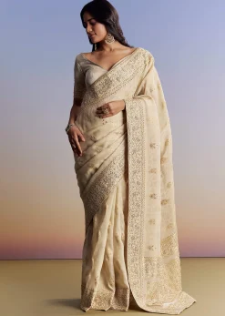 Cream Jacquard Silk Saree With Zari Brocade And Zardosi Embellished Pallu