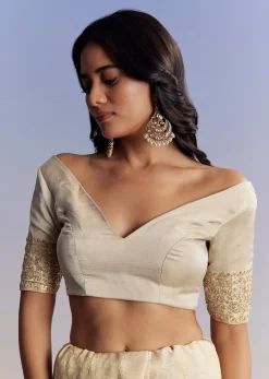 Cream Jacquard Silk Saree With Zari Brocade And Zardosi Embellished Pallu