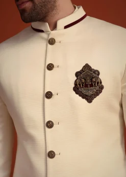 Cream Kurta Jodhpuri Set With Velvet Patch Work Broach