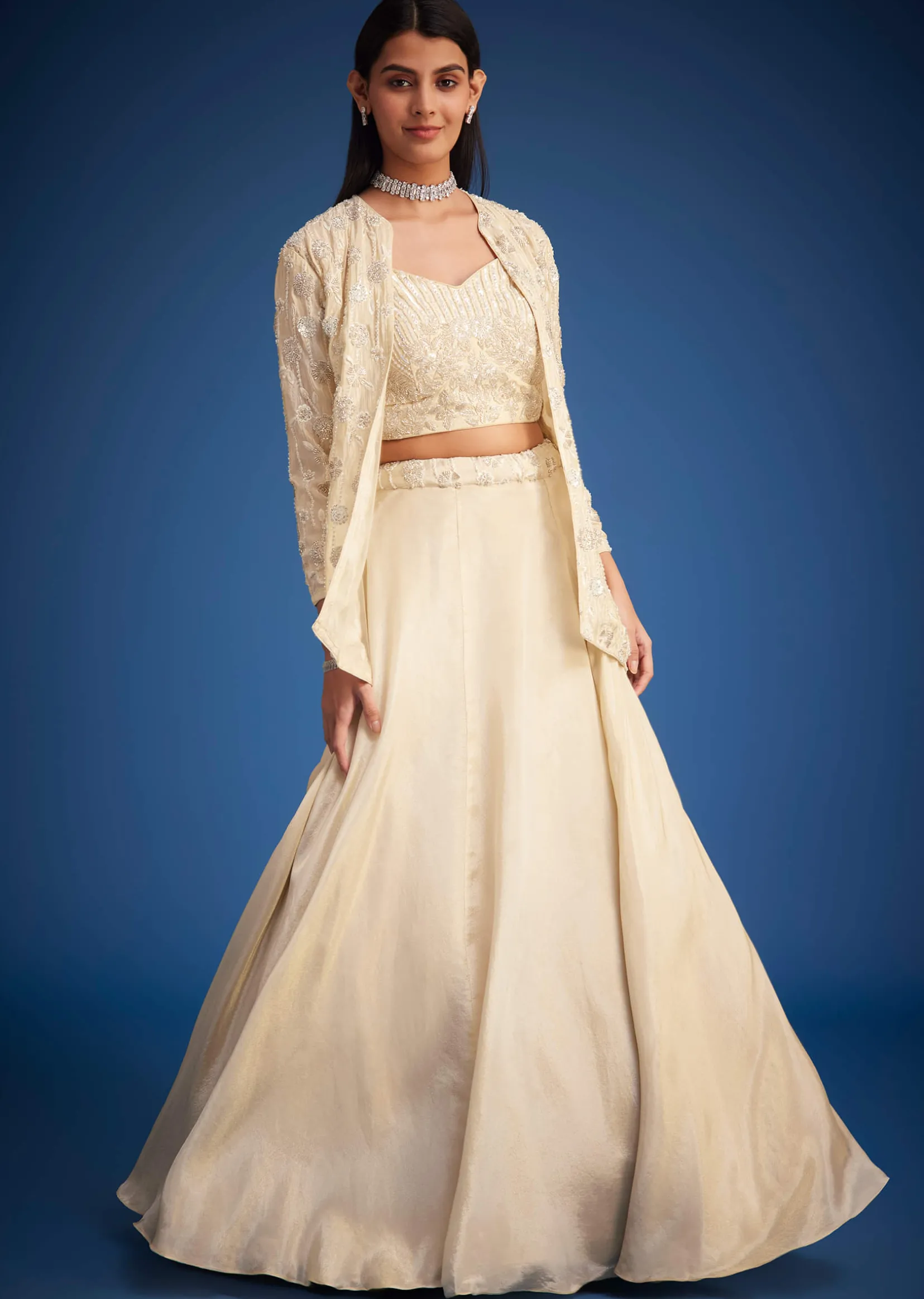 Cream Raw Silk Embroidered Jacket Lehenga Set