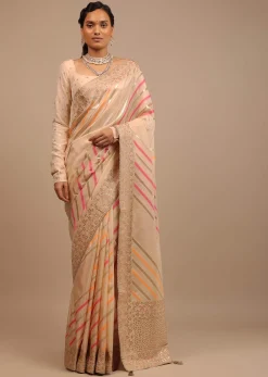 Cream Saree In Dola Silk With Multi Colored Woven Diagonal Stripes And Floral Border