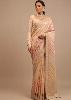 Cream Saree In Dola Silk With Multi Colored Woven Diagonal Stripes And Floral Border