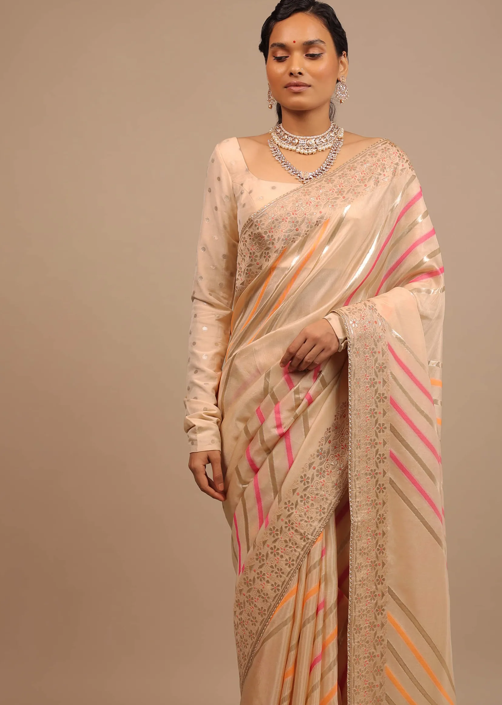 Cream Saree In Dola Silk With Multi Colored Woven Diagonal Stripes And Floral Border