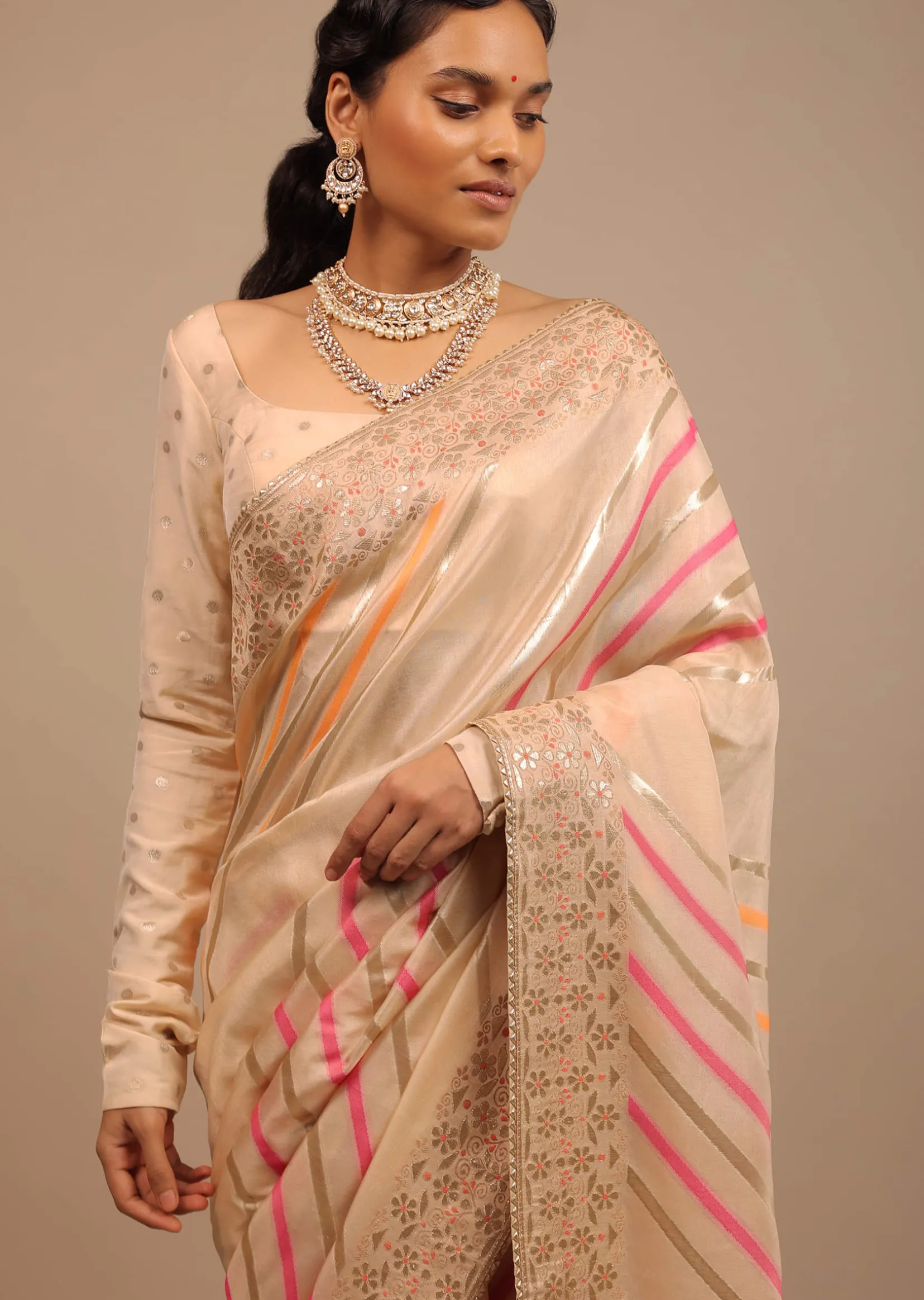 Cream Saree In Dola Silk With Multi Colored Woven Diagonal Stripes And Floral Border