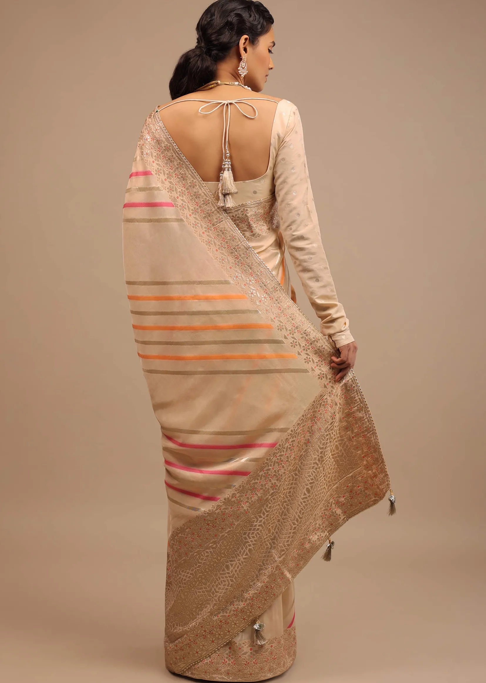 Cream Saree In Dola Silk With Multi Colored Woven Diagonal Stripes And Floral Border