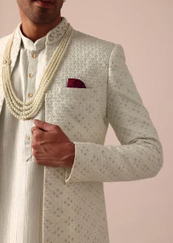 Cream Silk Sherwani Set With Intricate Embroidery
