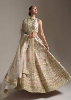 Creamy Pink Lehenga Choli In Raw Silk With Pink Resham And Zardosi Embroidered Floral Kalis Online - Kalki Fashion