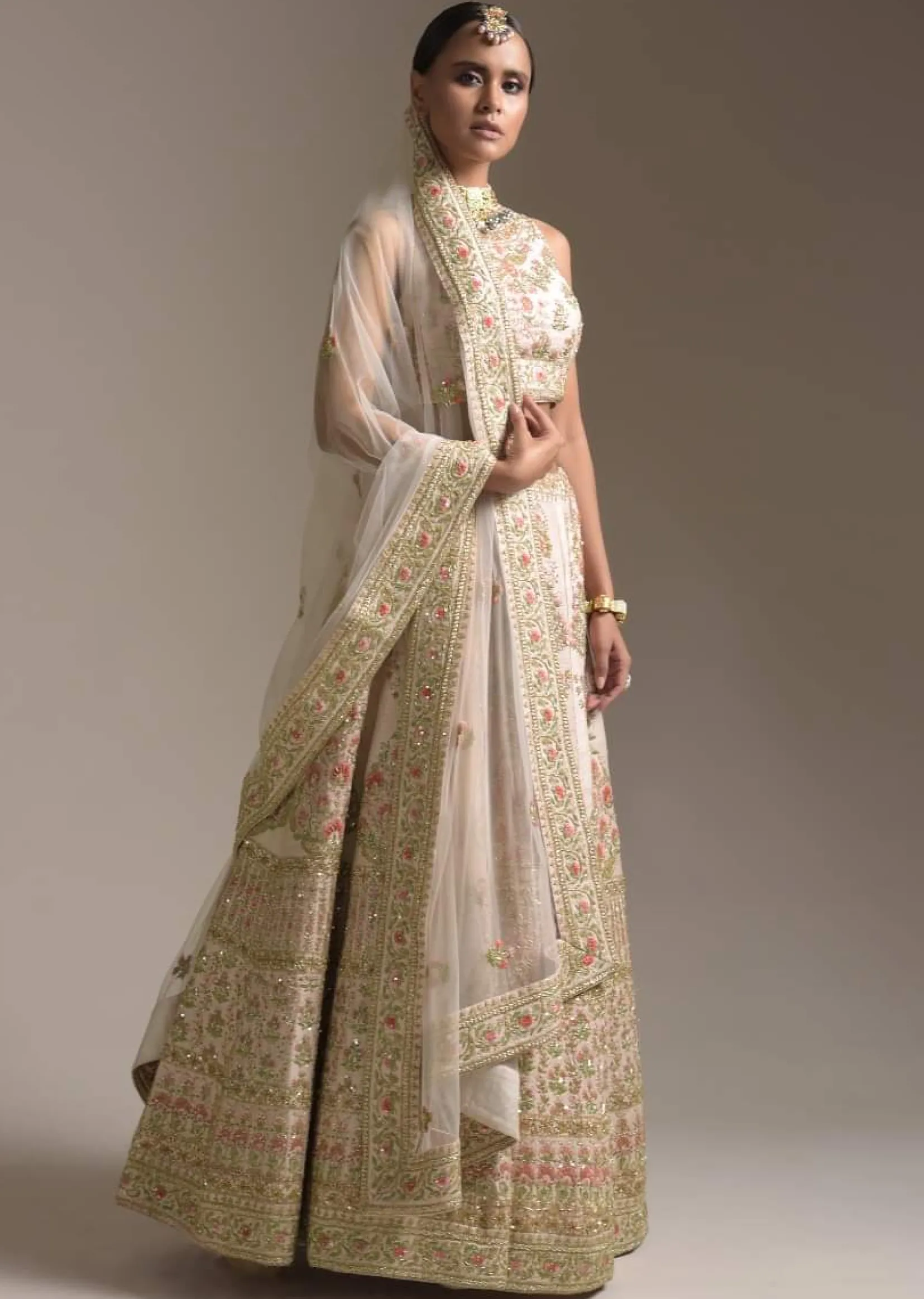 Creamy Pink Lehenga Choli In Raw Silk With Pink Resham And Zardosi Embroidered Floral Kalis Online - Kalki Fashion