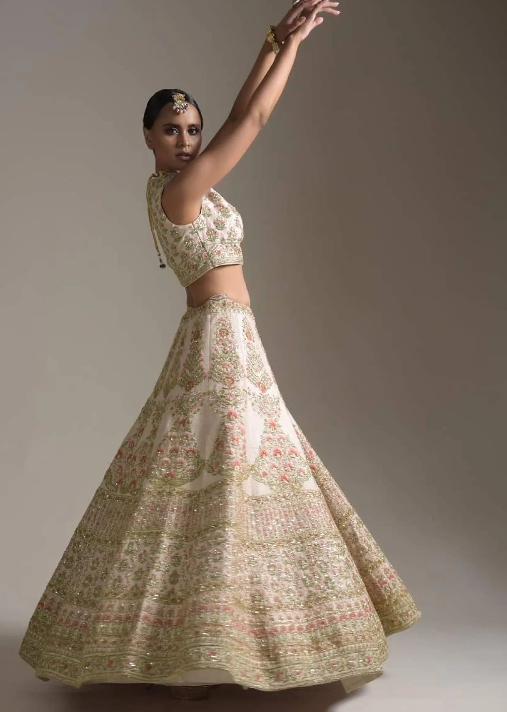 Creamy Pink Lehenga Choli In Raw Silk With Pink Resham And Zardosi Embroidered Floral Kalis Online - Kalki Fashion