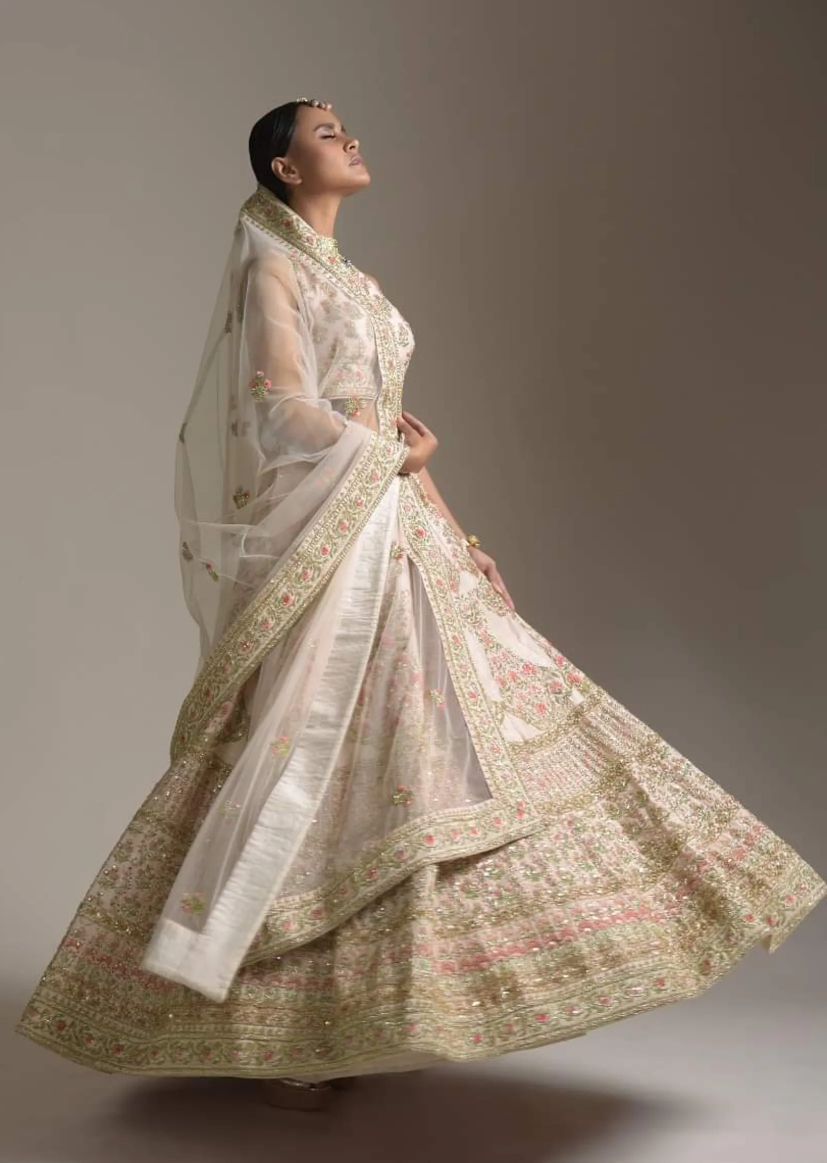 Creamy Pink Lehenga Choli In Raw Silk With Pink Resham And Zardosi Embroidered Floral Kalis Online - Kalki Fashion