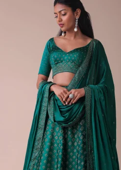 Deep Green Swarovski Embellished Lehenga In Wrinkle Satin