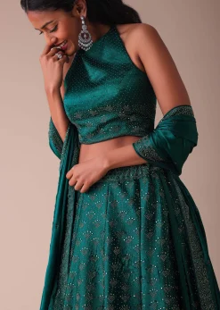 Deep Green Swarovski Embellished Lehenga In Wrinkle Satin