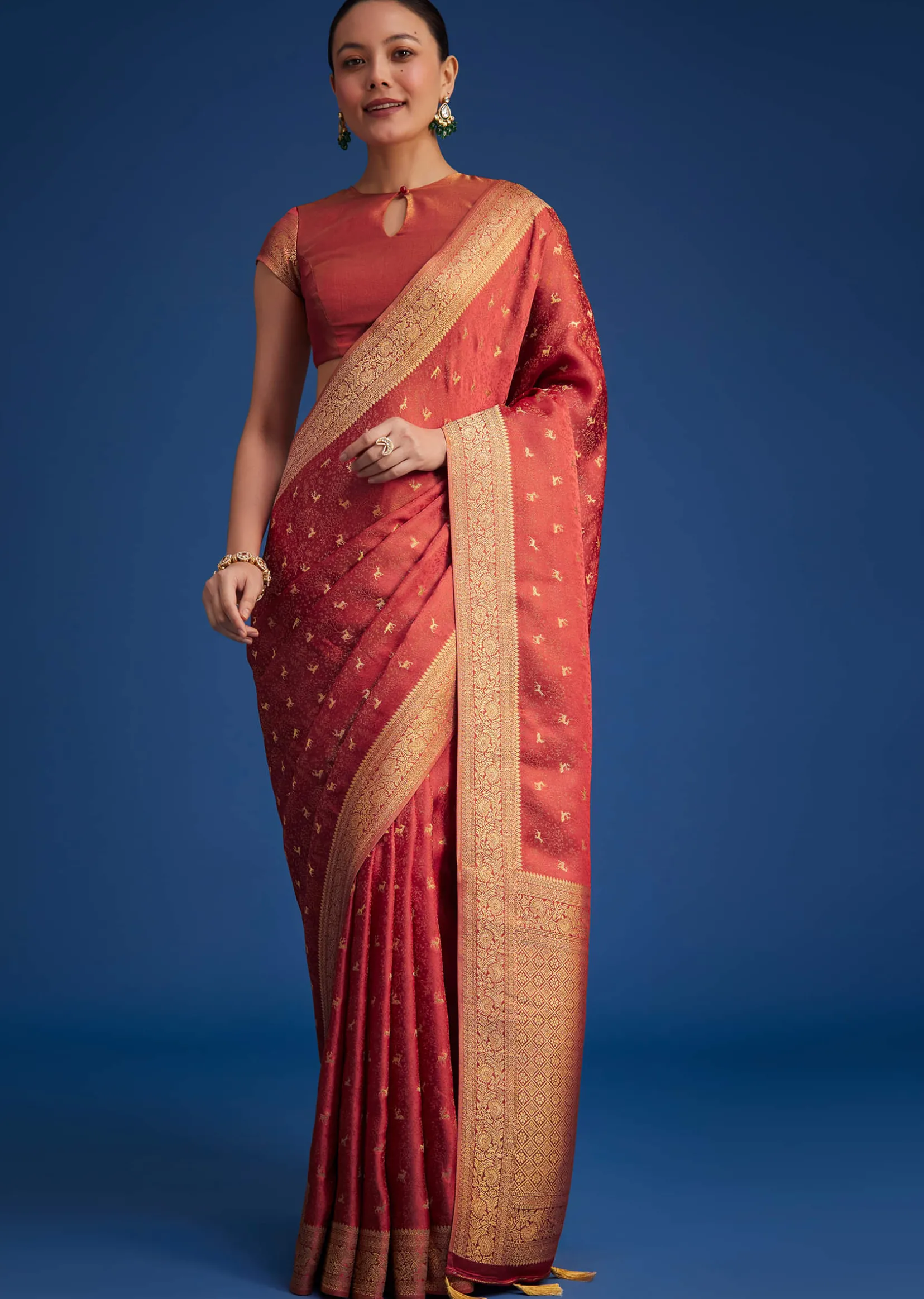 Dusky Orange Tissue Silk Saree With Zari Border And Butti Work