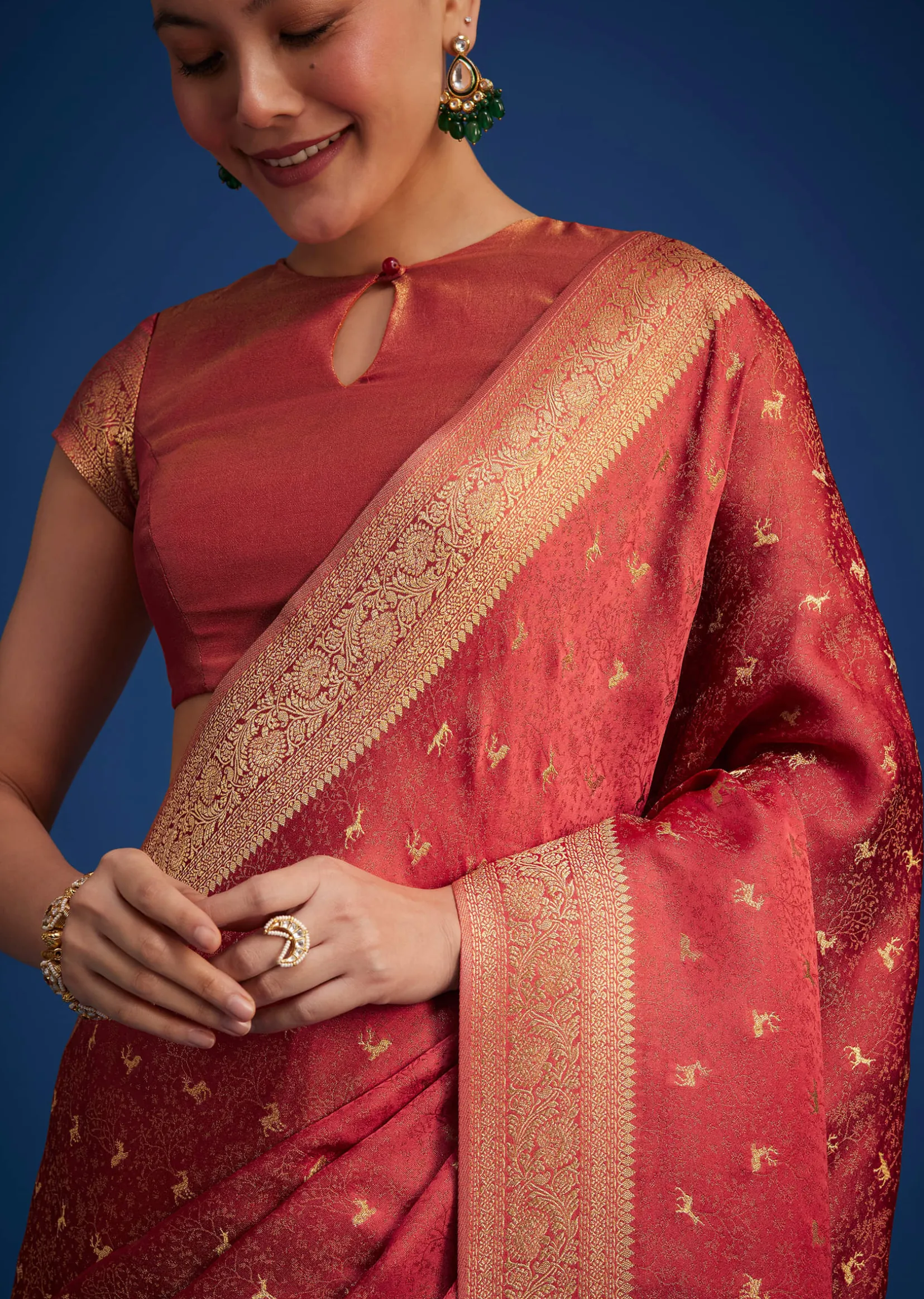 Dusky Orange Tissue Silk Saree With Zari Border And Butti Work