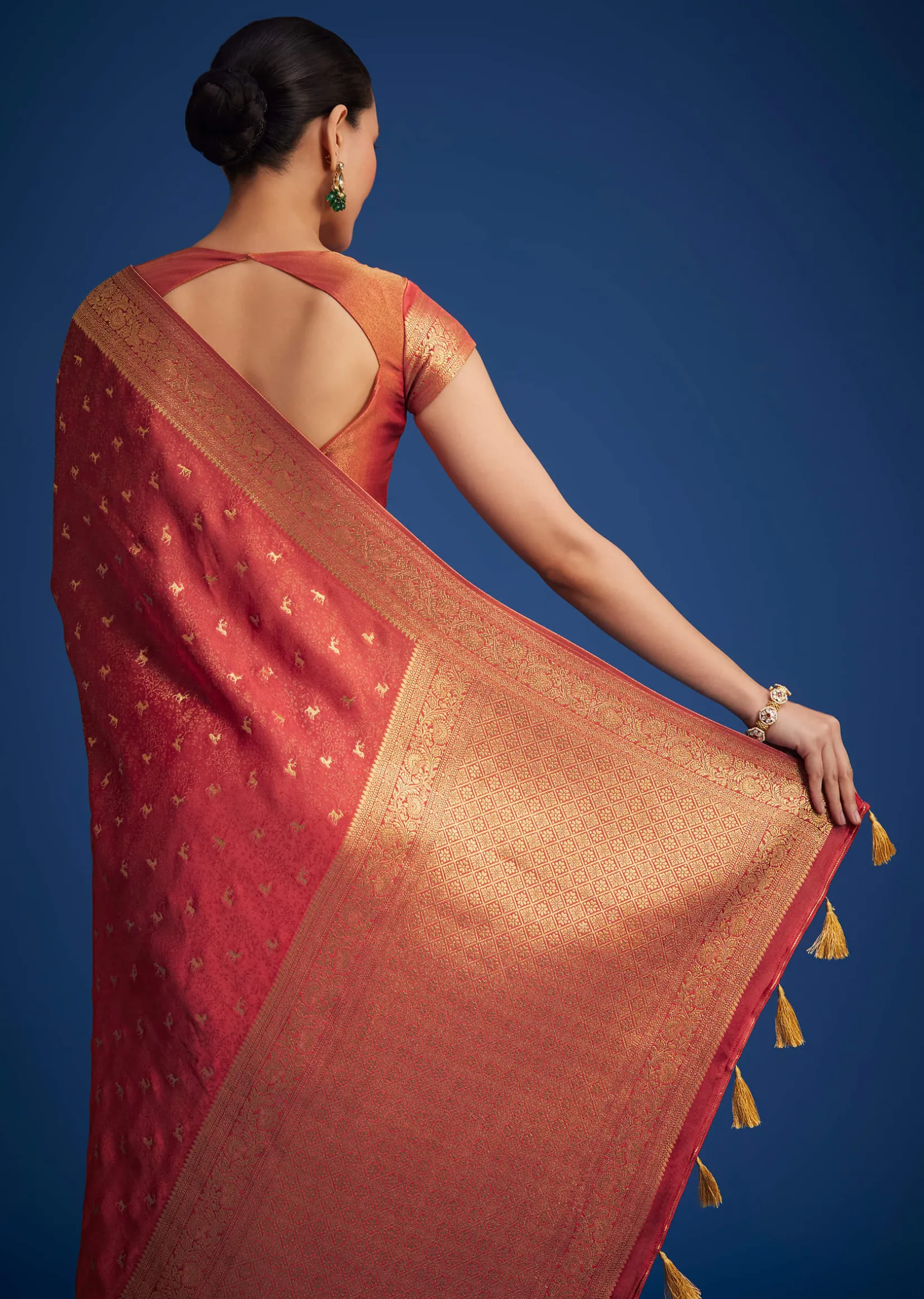 Dusky Orange Tissue Silk Saree With Zari Border And Butti Work