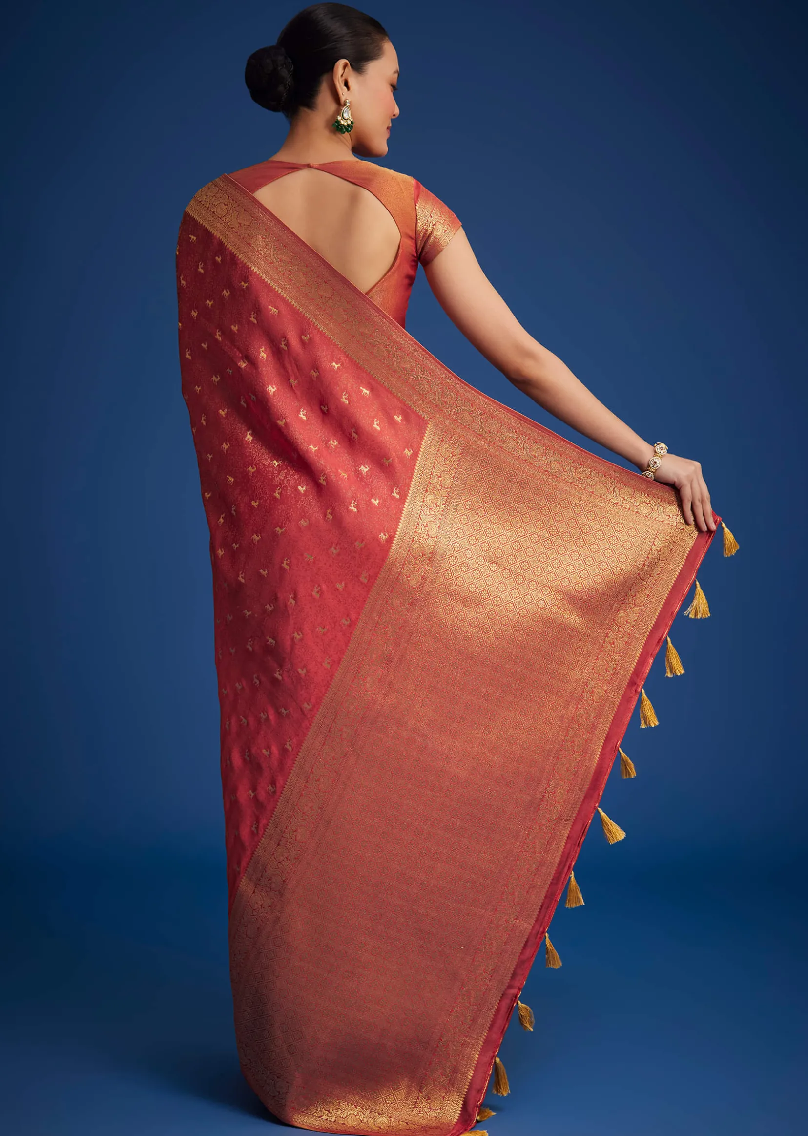 Dusky Orange Tissue Silk Saree With Zari Border And Butti Work