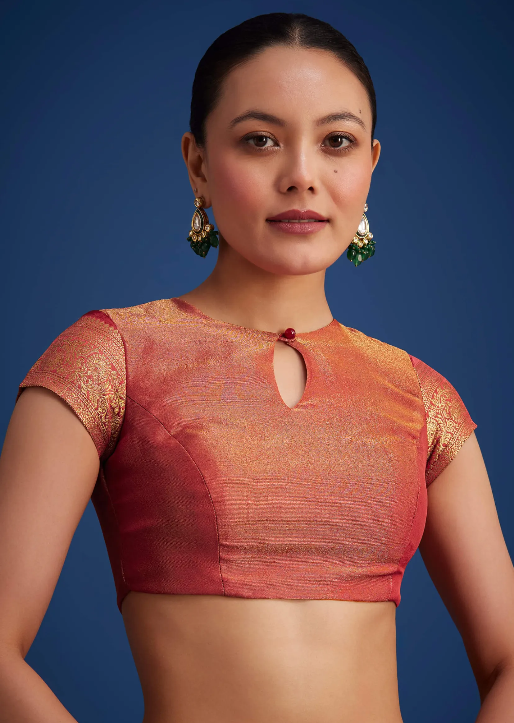 Dusky Orange Tissue Silk Saree With Zari Border And Butti Work