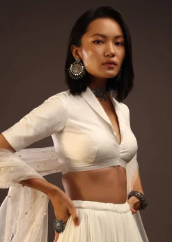 Egret White Half-Sleeved Blouse With Long Collar Neckline. Front Hook Closure With A Straight Hemline.