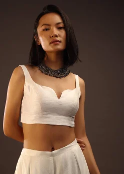 Egret White Sleeveless Blouse With A Sweetheart Neckline. Padded With A Back Hook Closure