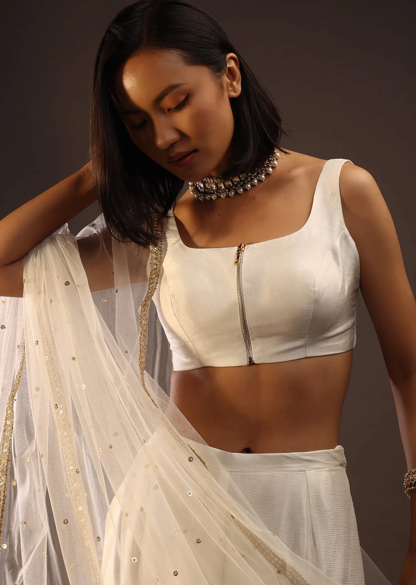Egret White Sleeveless Blouse With A Scoop Neckline